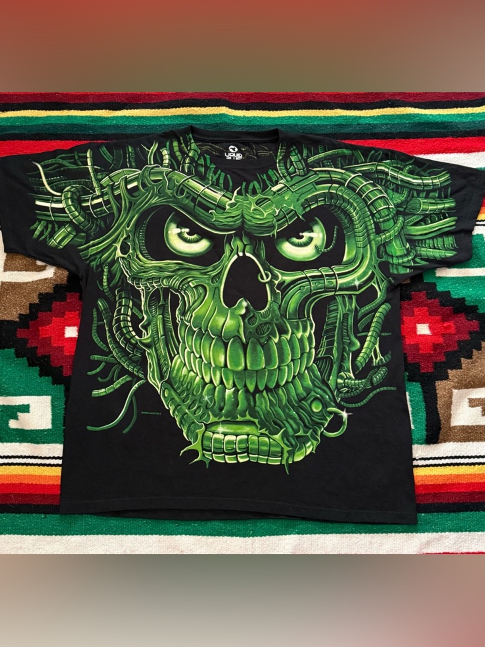 Liquid Blue Black Tee with Green Skull Graphic